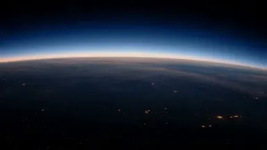 Continuous Fall From Orbit to a Raindrop